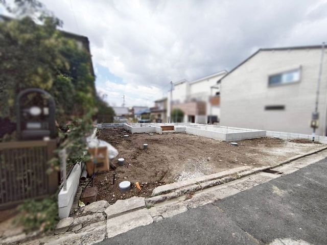 �ޗǌ��ޗǎs���ؒҒ� �̐V�z��ˌ��Ă̌��n�O�ώʐ^